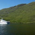 the tour boat passing the north shore of beautiful Killary Fjord